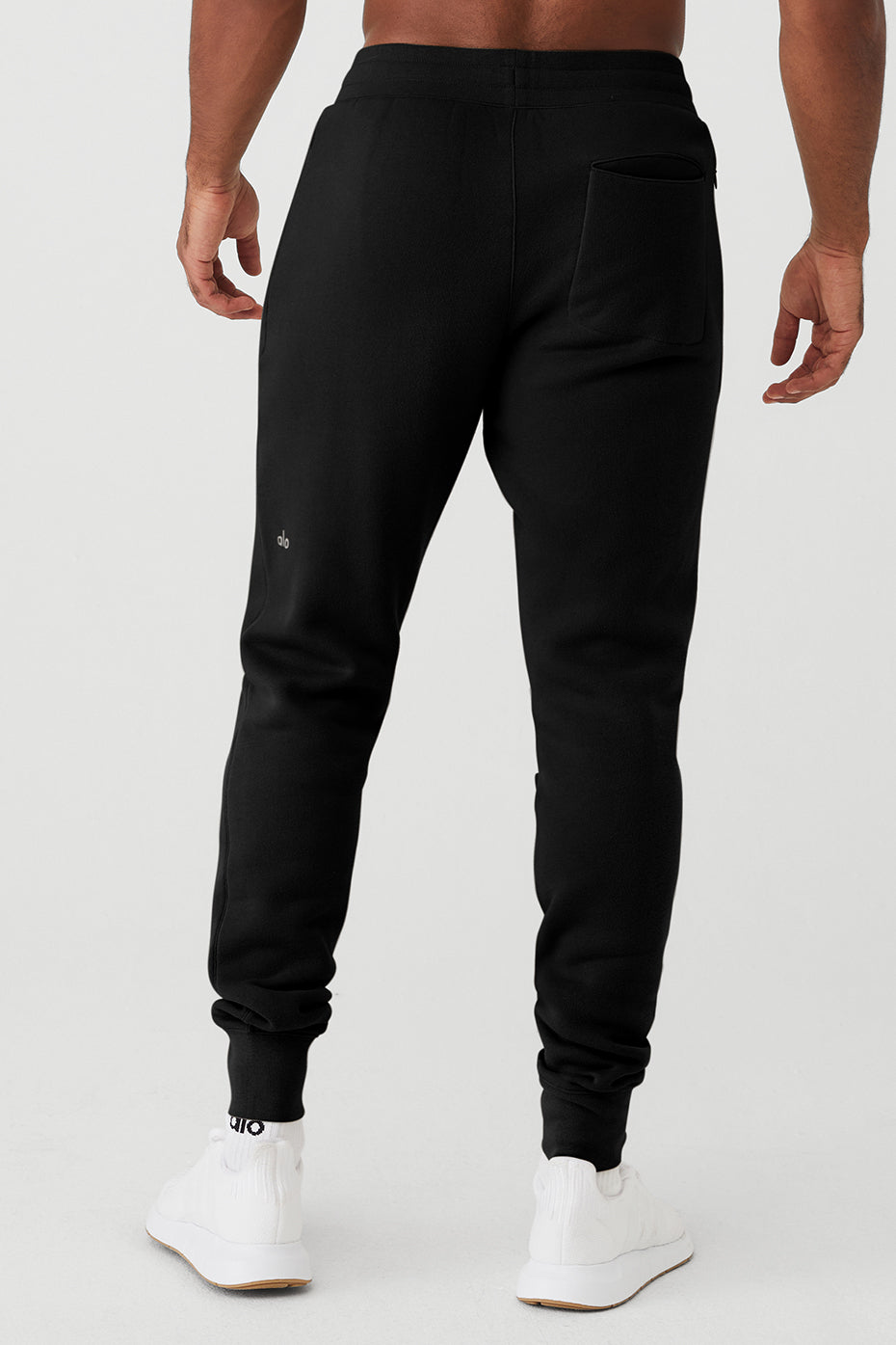 Black Men's Alo Yoga Baseline Sweatpants | PYN-310742