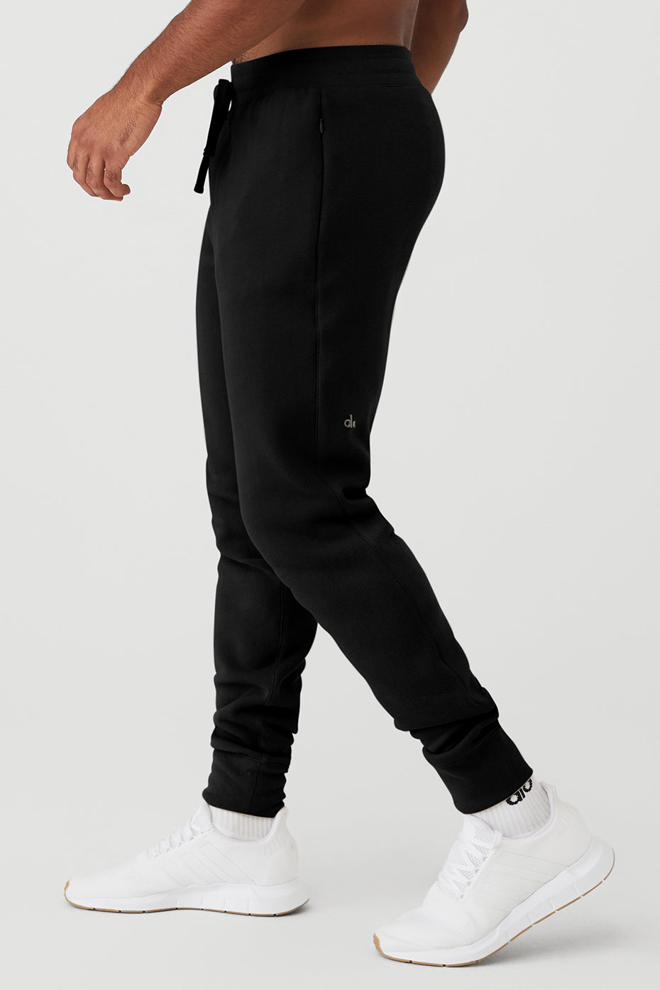 Black Men's Alo Yoga Baseline Sweatpants | PYN-310742